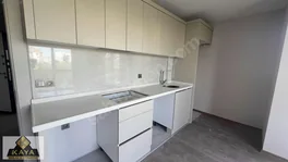 Klimalı Döşemealtı Tam merkezde Cadde Üstü şık Geniş 1+1 — fotoğraf 1